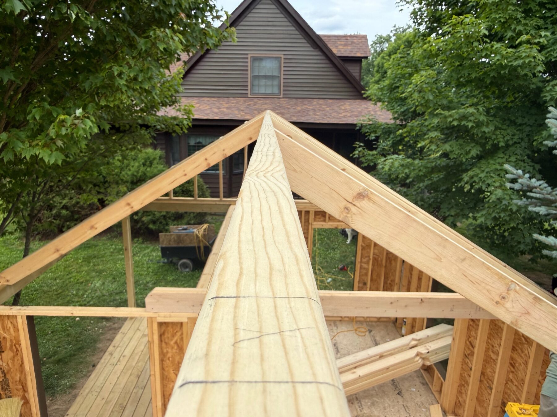 Roof and wall framing during a custom outdoor construction project